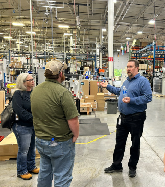 People standing in a manufacturing facility